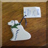 D106. Brick Pond Handworks pottery dog ornament. 